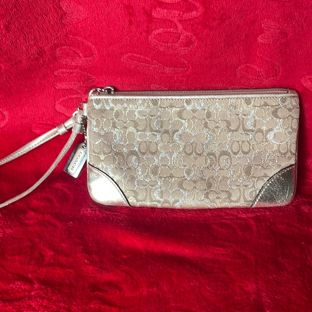Coach gold wristlet signature, C pattern